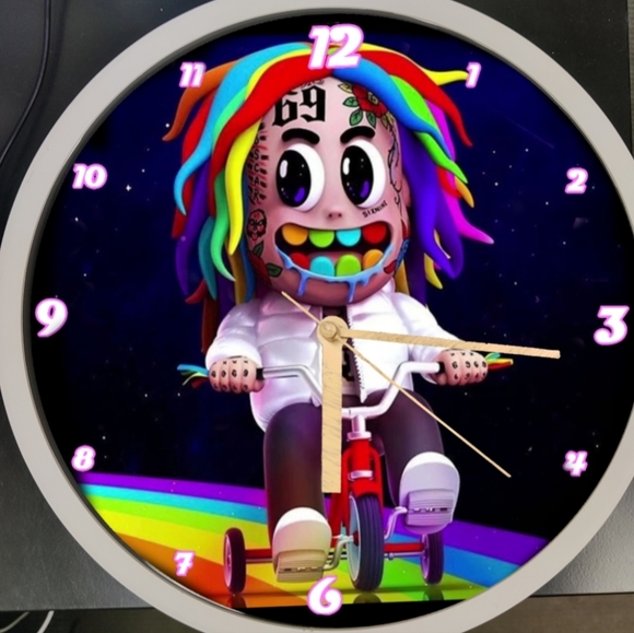 Tekashi on a rainbow bike - Picture 3 of 3